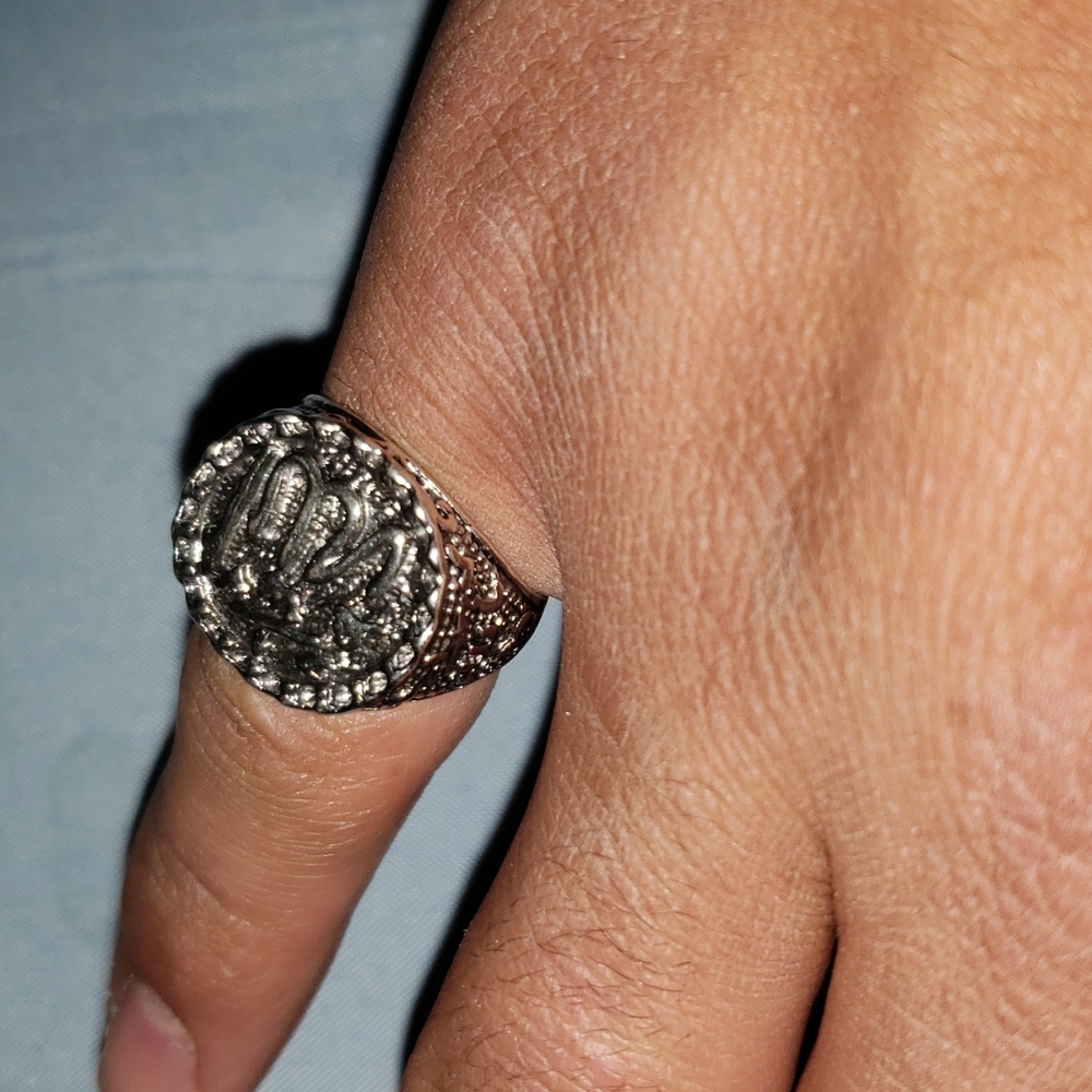 A stainless ring with the name of Allah on it